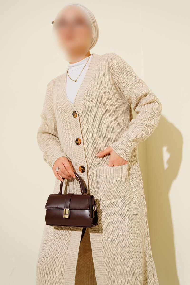 Long cardigan beige à poche boutonnée