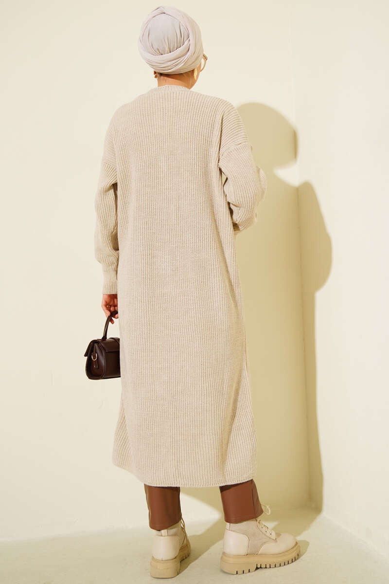 Long cardigan beige à poche boutonnée