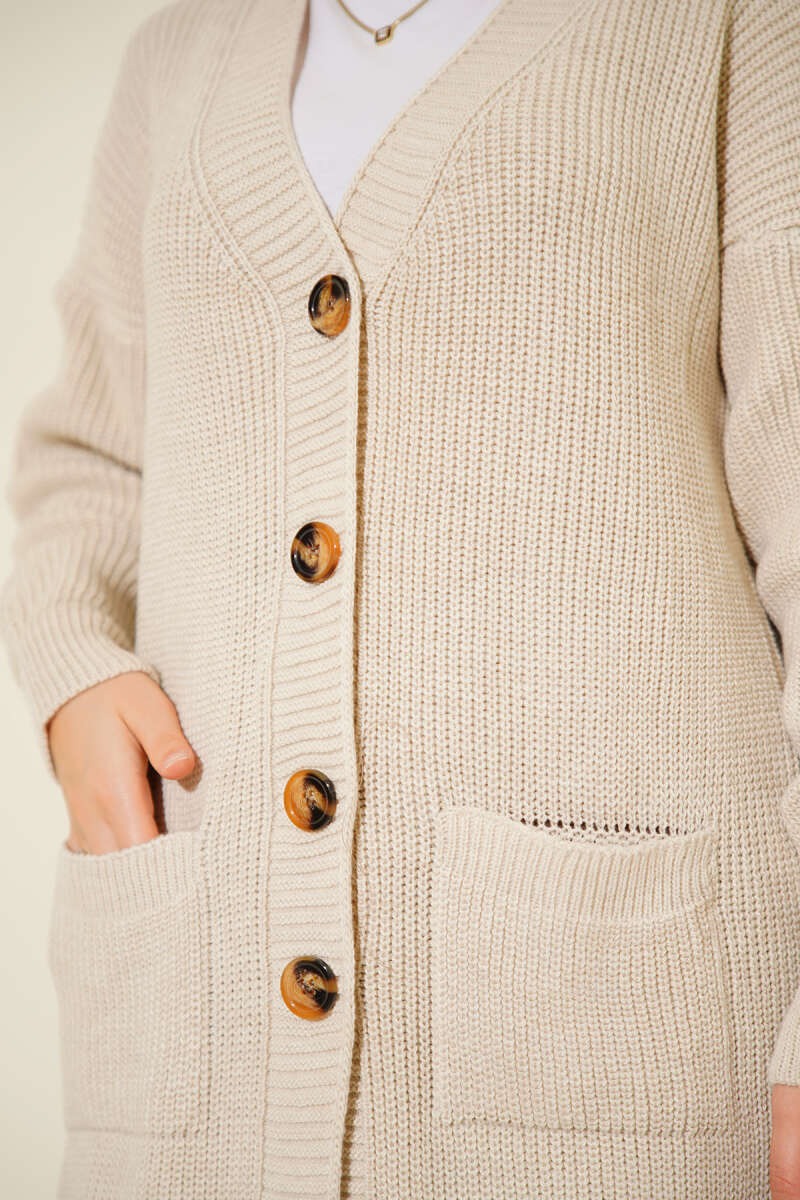 Long cardigan beige à poche boutonnée