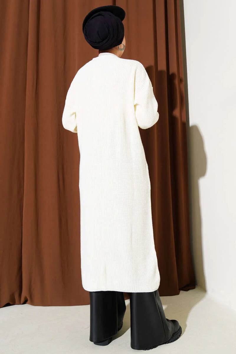 Gilet long écru à poche boutonnée