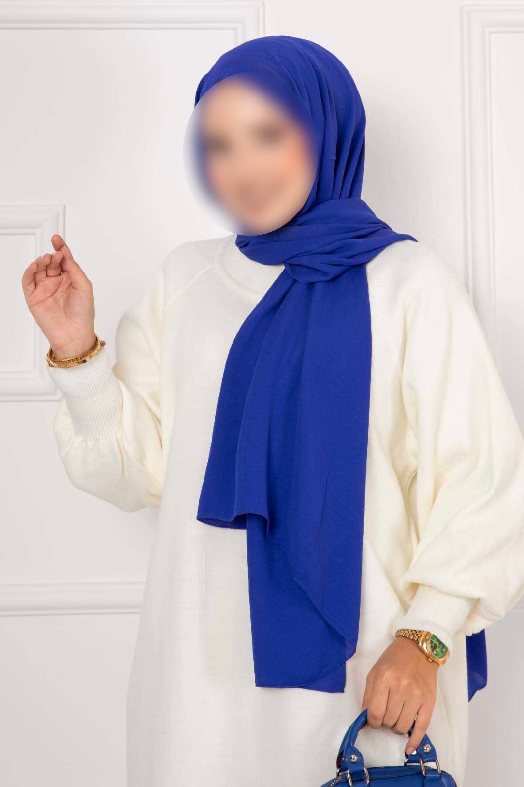 Robe en maille écru à manches bouffantes