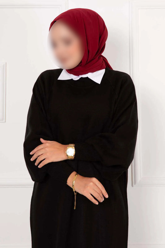 Robe noire en maille à manches bouffantes